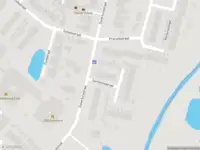 Brandweer met grote spoed naar de Symfoniestraat in Enschede vanwege personen te water