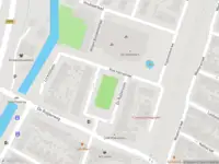 Ambulance met grote spoed naar de De Ruijterplein in Haarlem