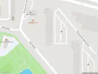 Ambulance met grote spoed naar de Burgemeester Hogguerstraat in Amsterdam