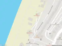 Brandweer en politie met gepaste spoed naar de Strandafgang De Favauge in Zandvoort