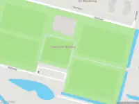 Ambulance met grote spoed naar de Maxisweg in Muiden