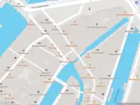 Brandweer met gepaste spoed naar de Sint Olofssteeg in Amsterdam vanwege schoorsteenbrand