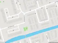 Ambulance met grote spoed naar de Dr. J.J. van der Horststraat in Zaandijk
