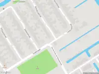 Ambulance met gepaste spoed naar de Rhijnsburgstraat in Rotterdam