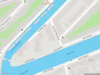 Ambulance met grote spoed naar de Korte De Wittenstraat in Amsterdam