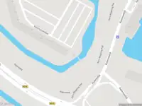 Ambulance met grote spoed naar de Valeriusrondeel in Capelle aan den IJssel