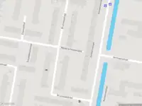 Ambulance met gepaste spoed naar de Bruinissestraat in Rotterdam