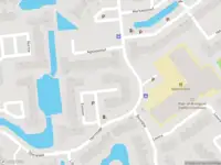 Ambulance met grote spoed naar de Evoluon in Capelle aan den IJssel
