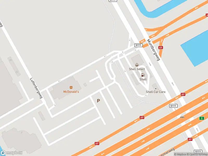Ambulance met gepaste spoed naar de Muntbergweg in Amsterdam
