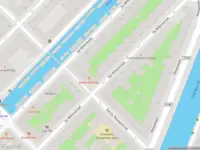 Ambulance met grote spoed naar de Eerste Nassaustraat in Amsterdam