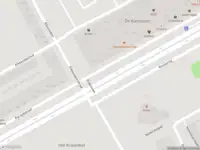 Ambulance met grote spoed naar de Karspeldreef in Amsterdam