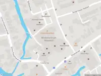 Ambulance naar de Raadhuisplein in Wervershoof vanwege ongeval met letsel