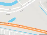 Ambulance met gepaste spoed naar de Noordzeeweg in Amsterdam
