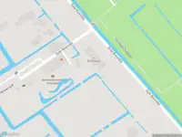 Ambulance met grote spoed naar de Oude Bovendijk in Rotterdam