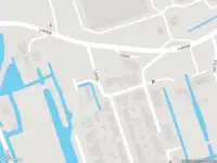 Ambulance met gepaste spoed naar de Julianastraat in Langerak