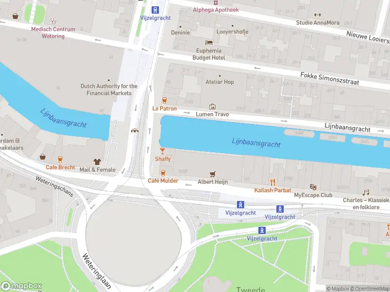 Ambulance met gepaste spoed naar de Den Texstraat in Amsterdam