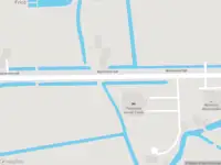 Brandweer en politie met grote spoed naar de Wartensterdyk in Wergea vanwege middelgrote brand
