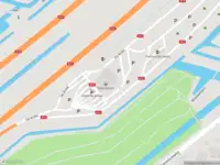 Ambulance met grote spoed naar de De Andel in Gouda