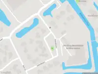 Brandweer met gepaste spoed naar de West in Buitenpost vanwege een buitenbrand