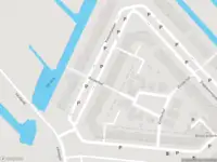 Ambulance met grote spoed naar de Koolwitjelaan in 's-Gravenhage