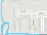 Ambulance met grote spoed naar de Westbroekstraat in Amsterdam