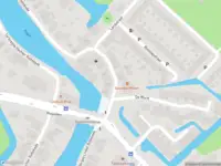 Ambulance met gepaste spoed naar de Bergse Linker Rottekade in Rotterdam