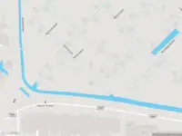 Ambulance met gepaste spoed naar de Molenwerf in Amsterdam