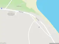 Ambulance naar de Volharding in De Cocksdorp vanwege ongeval met letsel