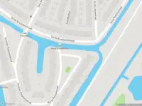 Ambulance met grote spoed naar de Marga Klompéstraat in Leiden