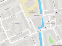 Ambulance met grote spoed naar de Warmoezenierstraat in Schiedam