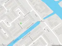 Ambulance met gepaste spoed naar de Jantina van Hoornkade in Leiden