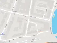 Ambulance met gepaste spoed naar de Minstreelstraat in Rotterdam