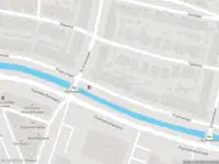 Ambulance met grote spoed naar de Priamsingel in Capelle aan den IJssel