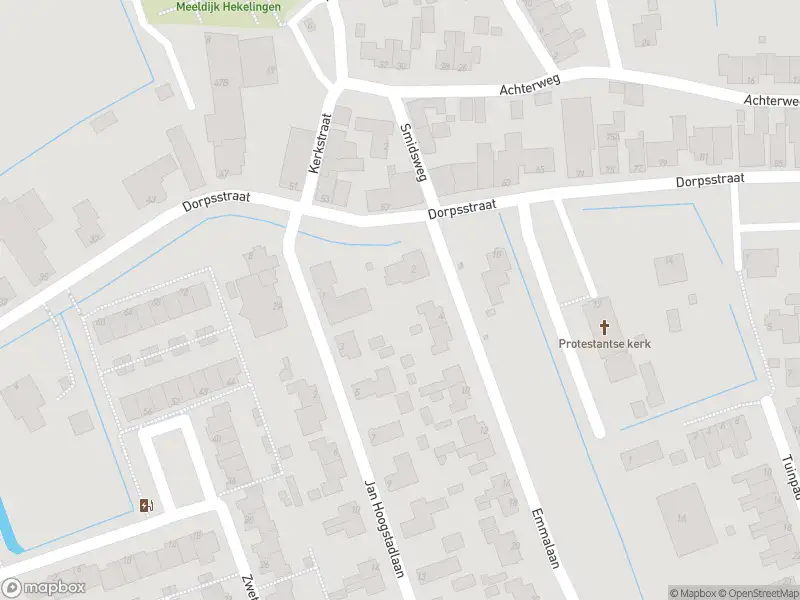 Ambulance met grote spoed naar de Dorpsstraat in Hekelingen