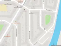 Ambulance met grote spoed naar de Rijnsburgstraat in Amsterdam