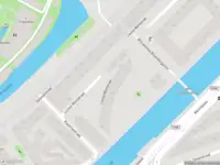 Ambulance met grote spoed naar de Louise Wentstraat in Amsterdam