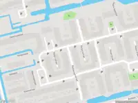 Ambulance met gepaste spoed naar de Rietzangerstraat in Delft