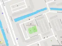 Ambulance met grote spoed naar de Dirk Costerplein in Delft