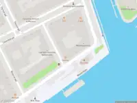 Ambulance met grote spoed naar de Westerkade in Rotterdam