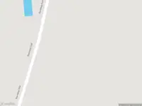 Brandweer en politie met grote spoed naar de Randweg-Oost in Budel vanwege middelgrote brand