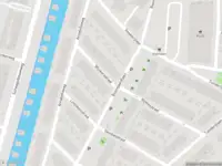 Ambulance met grote spoed naar de Wijnkersstraat in Amsterdam
