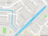 Ambulance met gepaste spoed naar de Lucretia van Merkenstraat in Leiden