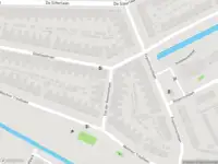 Ambulance met gepaste spoed naar de Van der Hoevenstraat in Leiden