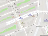 Ambulance met grote spoed naar de Dapperstraat in Amsterdam