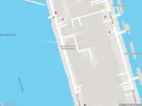 Ambulance met grote spoed naar de Minervahavenweg in Amsterdam