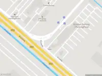 Ambulance met grote spoed naar de Kruisweg in Rozenburg