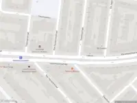 Ambulance met gepaste spoed naar de Vierambachtsstraat in Rotterdam