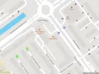 Ambulance met grote spoed naar de Nieuwlandplein in Schiedam