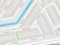 Ambulance met gepaste spoed naar de Hogerbeetsstraat in Rotterdam