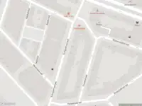 Ambulance met gepaste spoed naar de Schippersstraat in Rotterdam